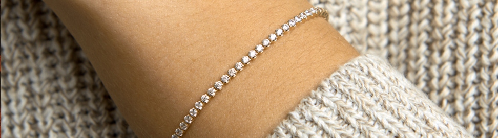 Gouden armband met steentjes