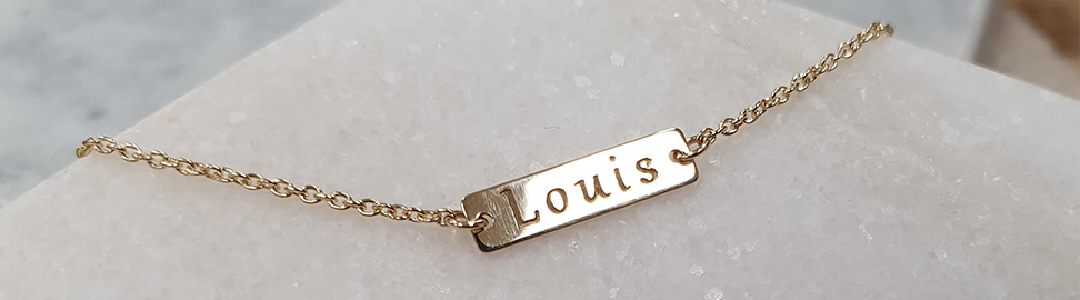 Gouden armband graveren