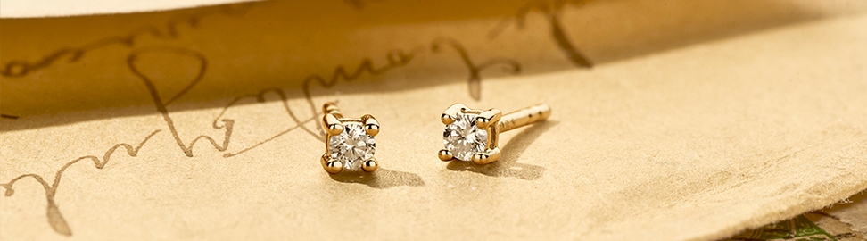 Gouden oorbellen met diamant