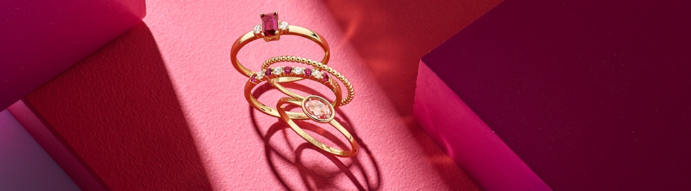 Gouden ringen met roze steen
