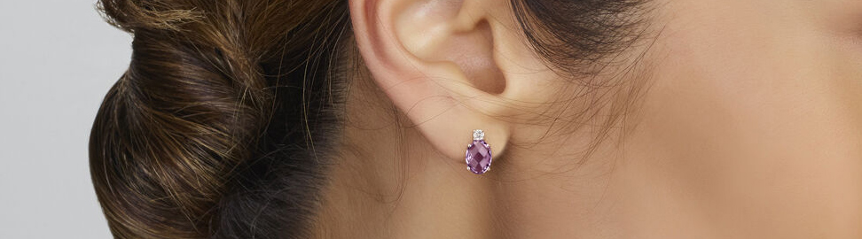 Zilveren sieraden met paarse steen