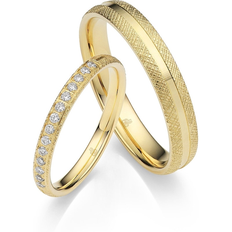 Rauschmayer RM-04 14k gouden trouwringen met 0,14 ct diamant