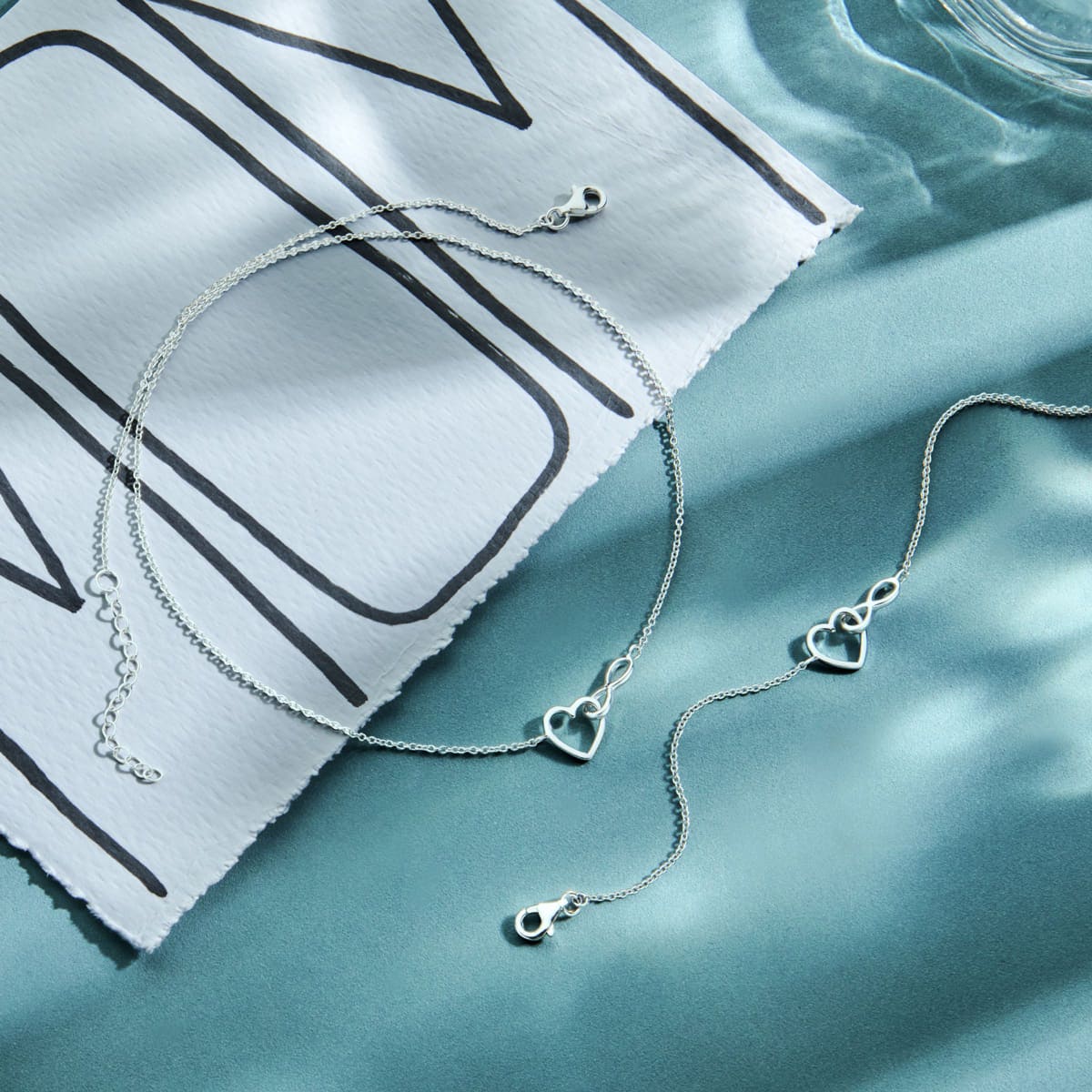 882823 Zilveren ketting met hart en infinity