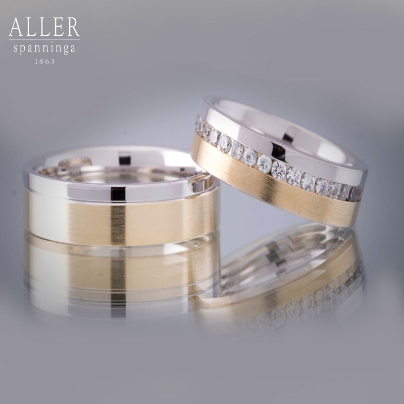 Aller Spanninga 964 14 karaat bicolor gouden trouwringen 0,76 ct diamant