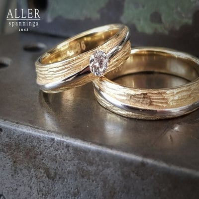 Aller Spanninga 983 14 karaat bicolor gouden trouwringen 0,20 ct diamant