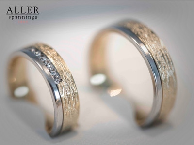 Aller Spanninga 989 14 karaat bicolor gouden trouwringen 0,21 ct diamant