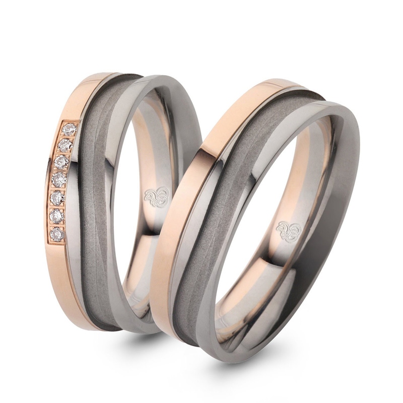 Rauschmayer RM-21 14k bicolor gouden trouwringen met 0,07 ct diamant